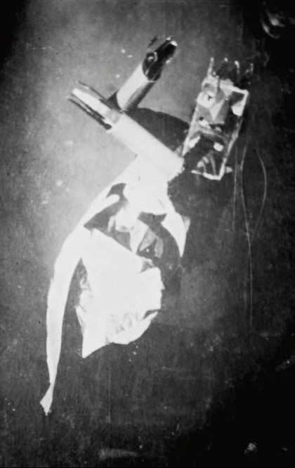 Sophie Taeuber-Arp performing to the sound poem by Hugo Ball in costume and mask probably by Jean (Hans) Arp on the occasion of the opening of the Galerie Dada, Zurich, March 1917 Stiftung Arp e.V., Berlin