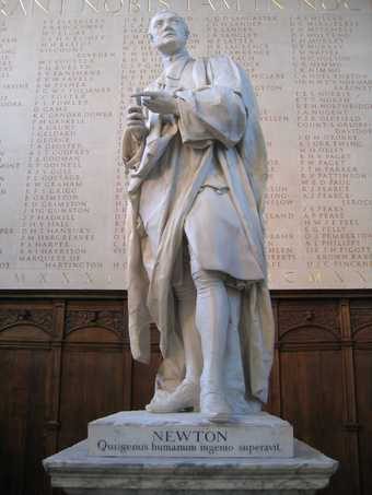 Statue of Isaac Newton at Trinity College, Cambridge showing inscription in Latin 'Newton, who surpassed the human race in understanding'