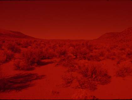 image of a desert with red filter