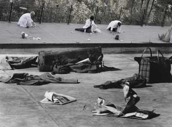 two black and white photos put together of people on a concrete floor with newspapers and bags on the floor