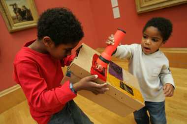 Kid with his sunset box