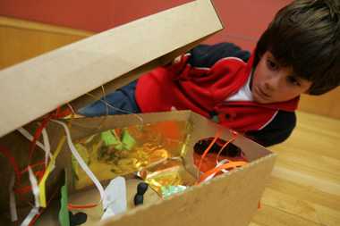 Kid with his sunset box