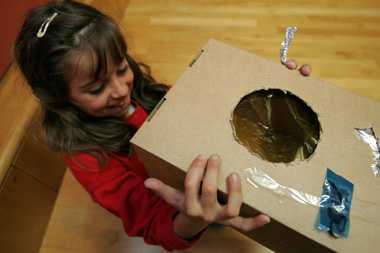 Kid with her sunset box