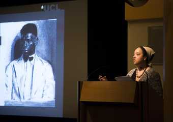 Black Subject symposium - talking at the stand with projection
