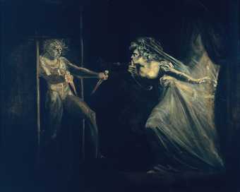 Two figures appear ghostly in the darkness. One appears to be Macbeth, holding two daggers, whilst the other is a woman in her night gown who holds a finger to her lip.