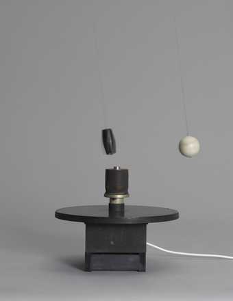 Takis, Magnetic Ballet, 1961, cork, electromagnet, magnet, nylon thread, steel and wood, 45 × 40 × 40 cm