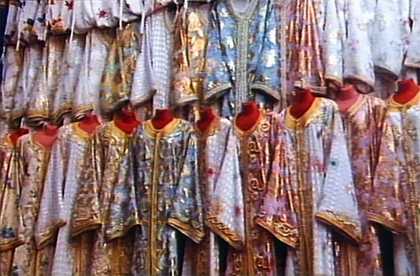 photograph of ornate embroidered clothing
