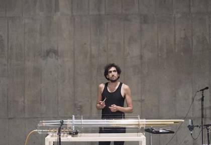 Photograph of artist Tarek Atoui performing The Reverse Collection 2014–2016