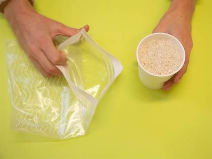 pouring rice into a bag