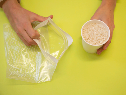 pouring rice into a bag