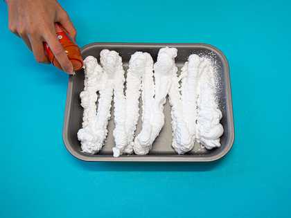 a baking tray filled with shaving foam