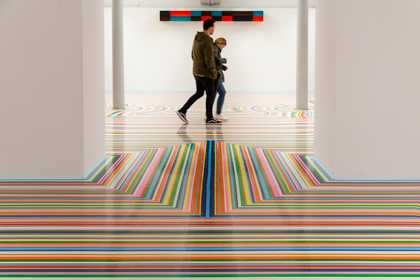 Visitors in the Op art display at Tate Liverpool
