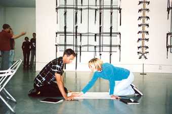 Participants in Tate Modern’s Summer Institute mapping connections between works shown in the History, Memory, Society suite, 2002