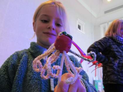 photograph of child with made object in Tate St Ives gallery