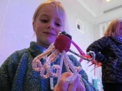 photograph of child with made object in Tate St Ives gallery
