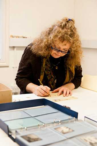 Tate Britain preservation volunteer Tara re-numbering Barbara Hepworth correspondence