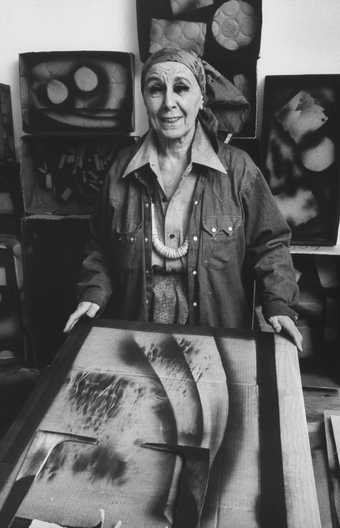 Louise Nevelson in her studio in New York City, 1974