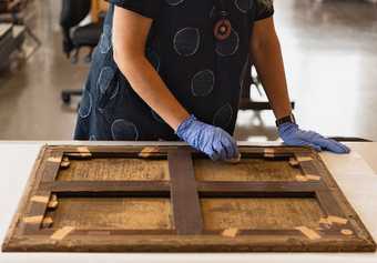 Photograph of a conservator at work at Tate 