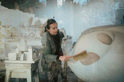 Photograph of a conservator at work at Tate
