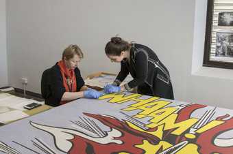 Tate NANORESTART team members Dr. Angelica Bartoletti and Rachel Barker carrying out the cleaning treatment of Lichtenstein’s Whaam!