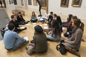 A group of teachers sitting in a circle