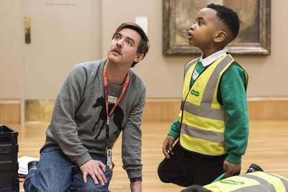 An artist and a schoolchild