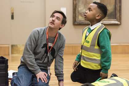 An artist and a schoolchild