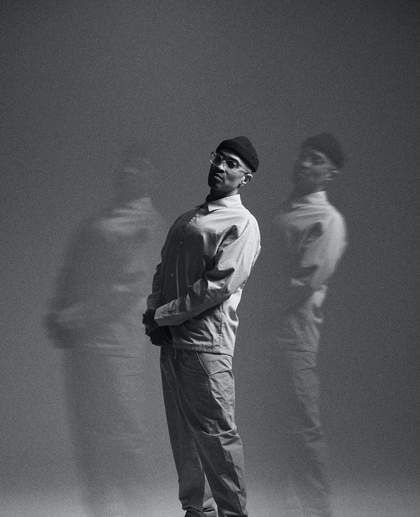 portrait of standing person in black and white