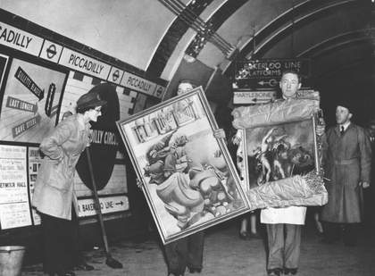 Works returning from storage in Piccadilly Underground station in 1946