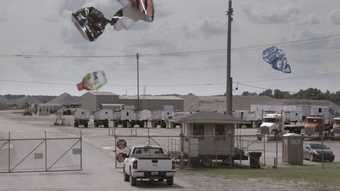 Colour photograph of trash in the air