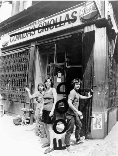 Tina Girouard Carol Goodden and Gordon Matta Clark in front of Food restaurant Prince Street at Wooster Street New York 1971