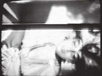 Video stills from Joan Jonas's Vertical Roll, 1972 (1)