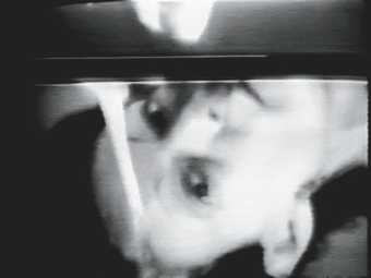 Video stills from Joan Jonas's Vertical Roll, 1972 (3)