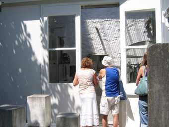 Visitors viewing Barbara Hepworth's studio at the Barbara Hepworth Museum and Sculpture Garden