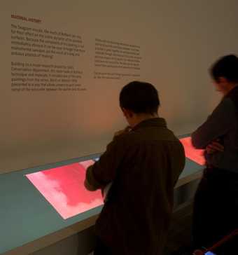 Visitors looking at interpretative material in Room 4 Rothko exhibition, Tate Modern