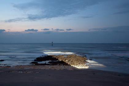 Still from Rosa Barba’s film White Museum (2010) projected onto the seafront at Turner Contemporary, Margate
