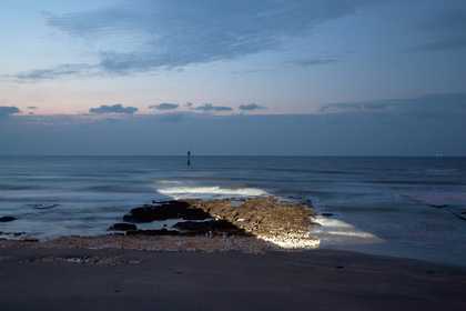 Still from Rosa Barba’s film White Museum (2010) projected onto the seafront at Turner Contemporary, Margate