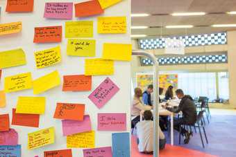 Sticky notes on the wall from a brainstorm