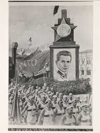 Celebratory procession featuring a portrait of N. Yezhov, head of NKVD in 1936-38 c. 1936-38. Tate Library and Archive
