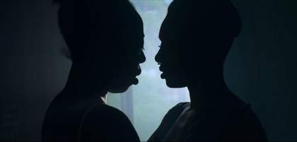 Two people facing eachother